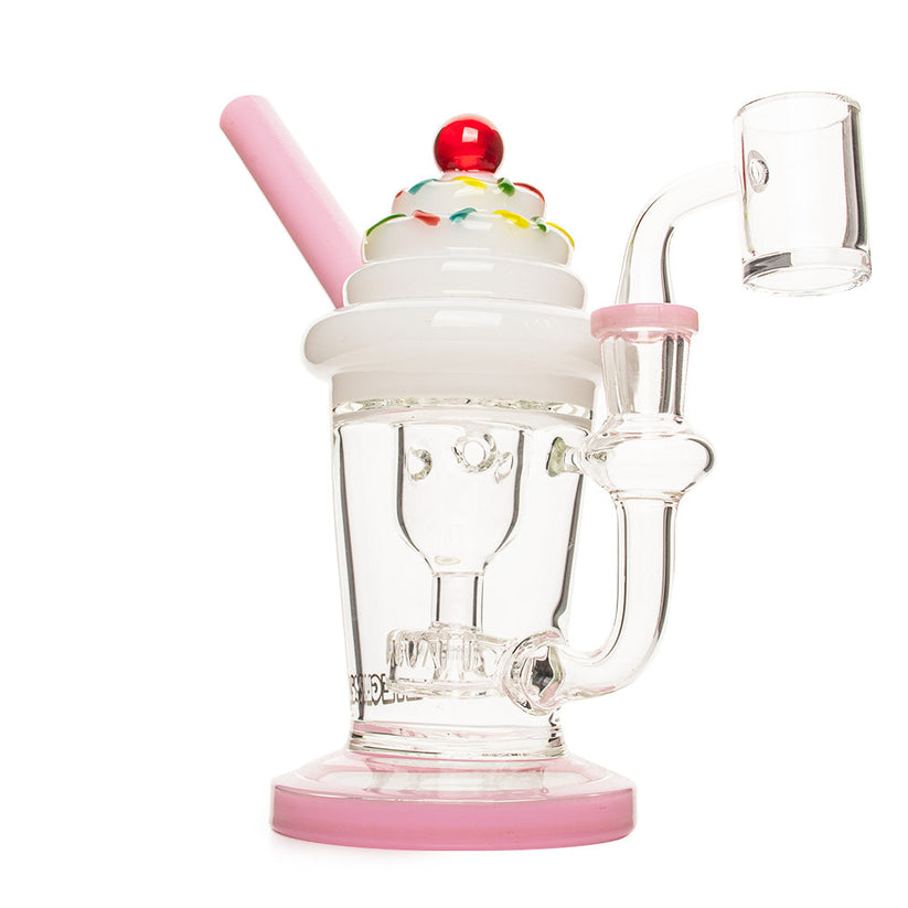 8 Tall Milkshake Incycler Rig styled as a pink-and-white milkshake with whipped cream, cherry, straw mouthpiece, and quartz banger for vaporizing concentrates.