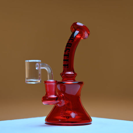 Red Mini Electroplated Dab Rig on a white surface, showcasing its sleek glass design and splash-guard ridges for a smooth, stylish dabbing experience.
