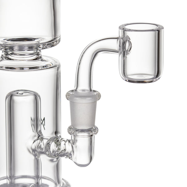 Column Mini Dab Rig - Clear with a quartz banger, showcasing a compact design, borosilicate glass construction, and curved neck for vaporizing concentrates.