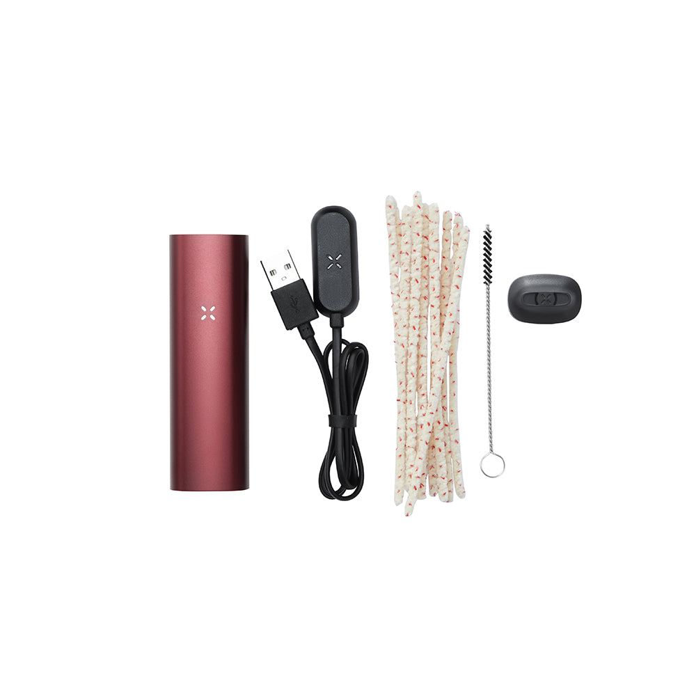 PAX 3 Basic Kit featuring a sleek vaporizer with charging cable, cleaning wicks, brush, and accessory piece for enhanced dry herb sessions.