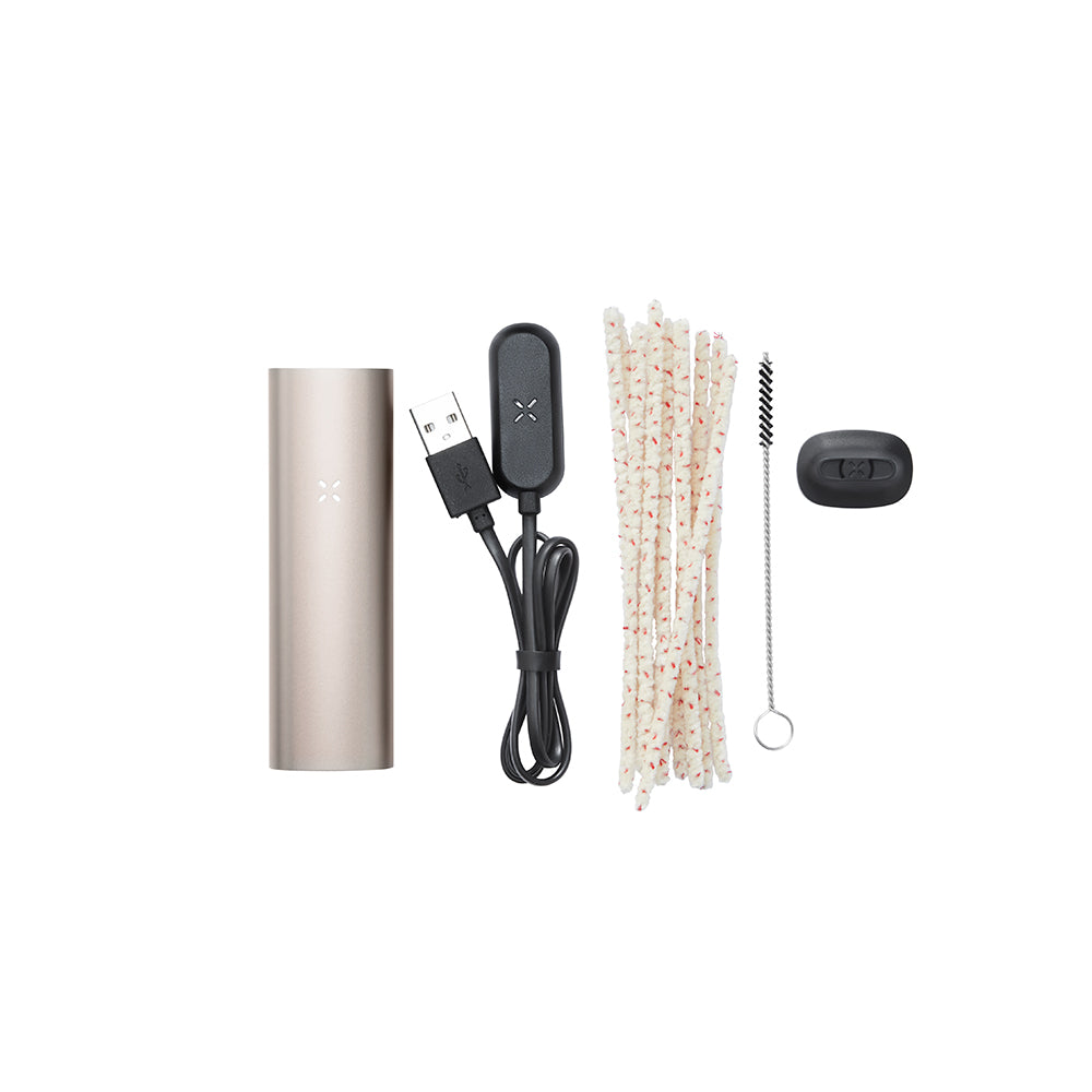 PAX 3 Basic Kit featuring a vaporizer body, USB charger, pipe-cleaners, brush, and spare mouthpiece for maintenance and enhanced performance.