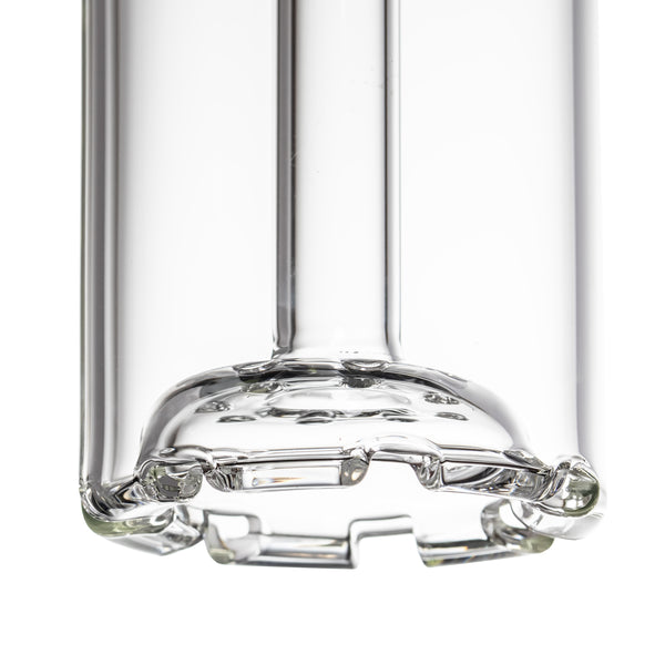 Close-up of the Piston Gravity Bong's thick, scalloped glass base, highlighting its precision-crafted borosilicate construction and innovative design.