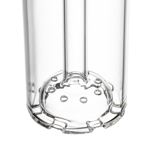 Piston Gravity Bong's glass percolator base with central down-stem and holes for smoke filtration, showcasing MJ Arsenal's innovative design and craftsmanship.