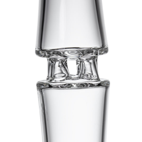 Spire - Clear: A close-up of two conical glass vessels joined rim-to-rim, showcasing the sleek, handcrafted borosilicate glass design of the MJ Arsenal Spire Water Pipe.