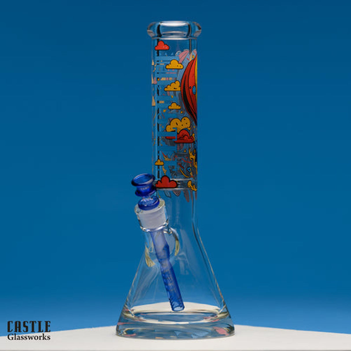 14 Beaker Bong - Robot, featuring a quirky robot design on durable borosilicate glass, offers a playful yet functional smoking experience with its bold graphics and sturdy build.
