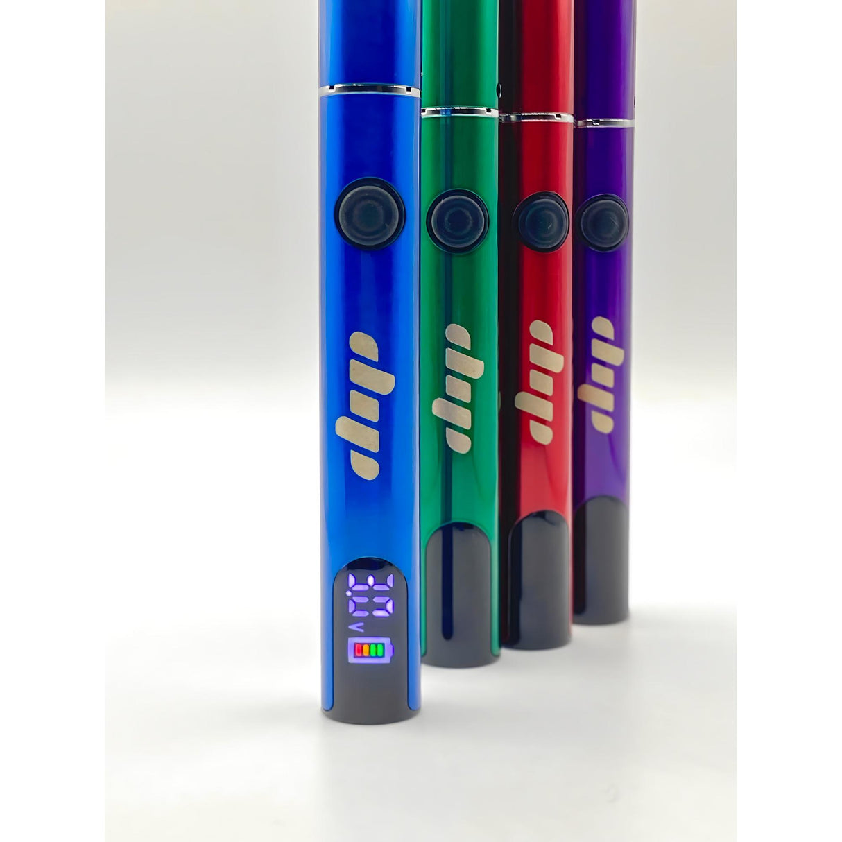 Four Lunar Dab Pens with metallic finishes, featuring a round power button, LED read-out, and compact design for easy portability and efficient dabbing.