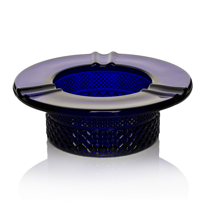Twenties Collection Ashtray features a round, textured design with three cigarette rests, crafted from durable borosilicate glass for stylish and practical desktop use.