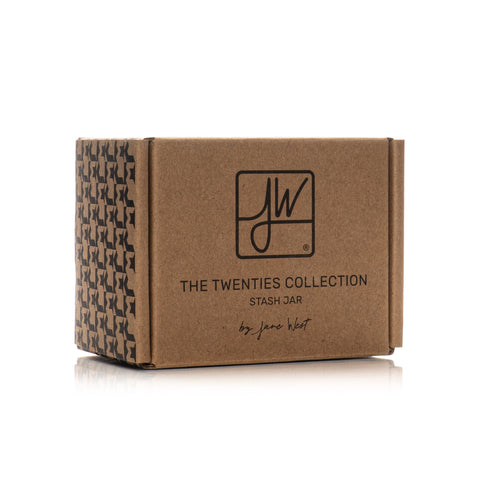 Kraft-paper box labeled with JW logo, THE TWENTIES COLLECTION, and STASH JAR by Jess Hart, indicating packaging for Jane West Twenties Collection Stash Jar.