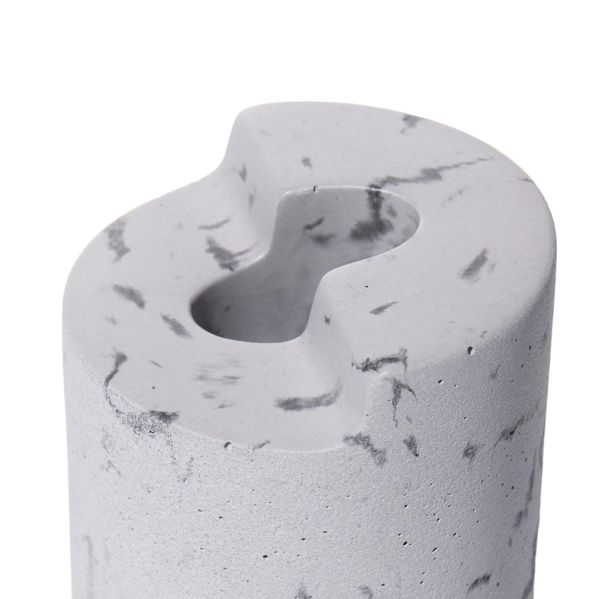 Anchor Lighter Holder: Light-grey, marble-veined concrete cylinder with a keyhole-shaped recess for securing standard pocket lighters, blending minimalist design and vintage inspiration.