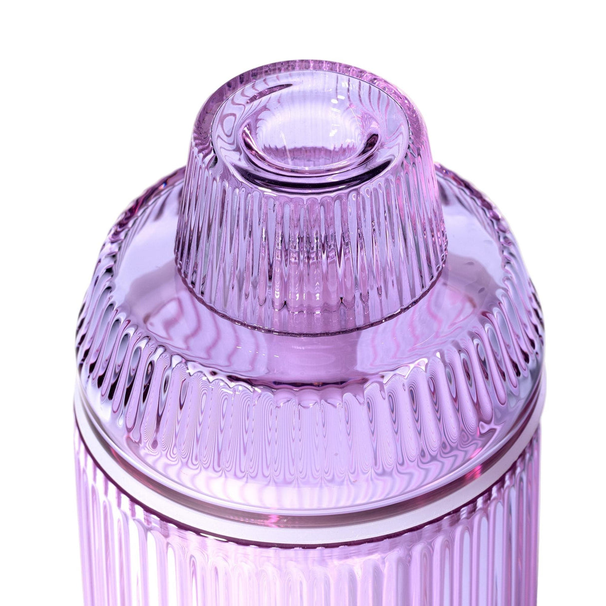 Close-up of Deco Gravity Bong in translucent, ribbed glass with a fluted pattern and matching lid, showcasing Art Deco elegance and modern functionality.
