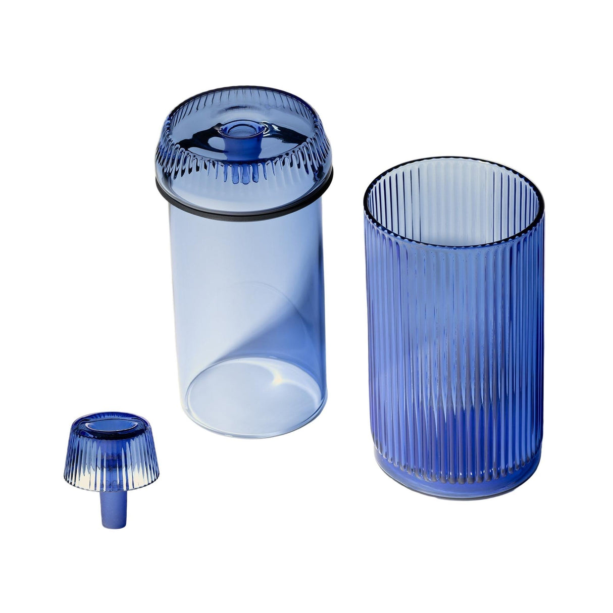 Deco Gravity Bong set: ribbed blue glass carafe with lid, matching tumbler. Art Deco design, borosilicate glass, combines elegance with modern functionality.