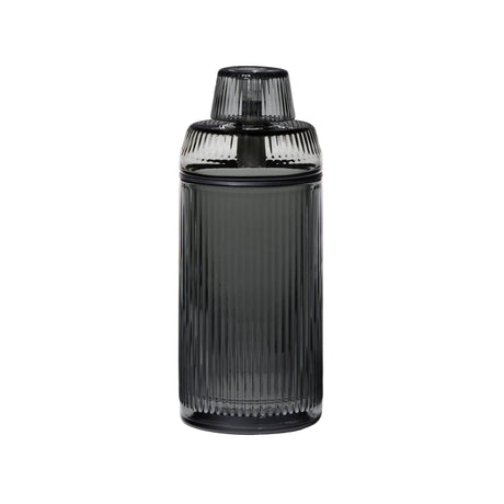 Deco Gravity Bong: A cylindrical, rib-textured smoked glass container with matching ribbed lid, showcasing vintage elegance and Art Deco design in premium borosilicate glass.