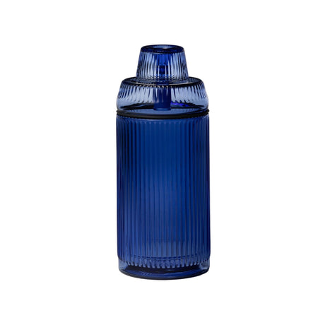 The Deco Gravity Bong features a cobalt blue, ribbed glass container with a three-part form, blending Art Deco elegance with modern functionality.