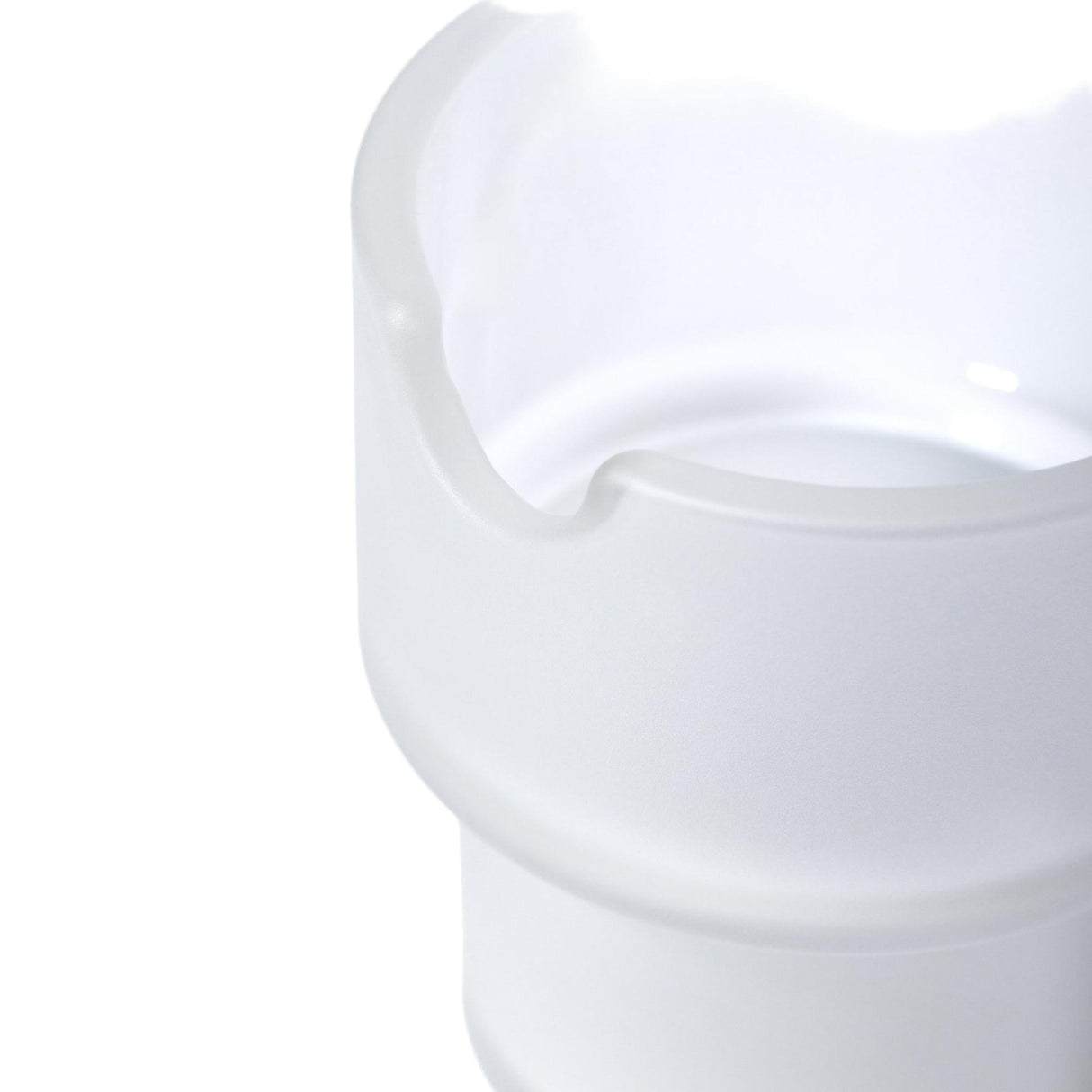 Close-up of the Flower Pots Ashtray Set, showcasing a milky-white, translucent cylindrical vessel with a pour spout, highlighting its minimalist, sculptural design.