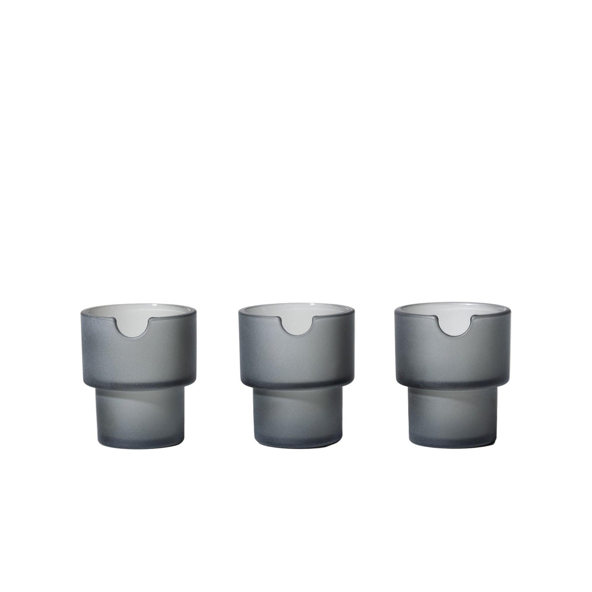 Three identical Flower Pots Ashtray Set pieces, featuring a matte-grey to frosted exterior gradient and glossy white interior, with notched rims for teabag tags or small spoons.