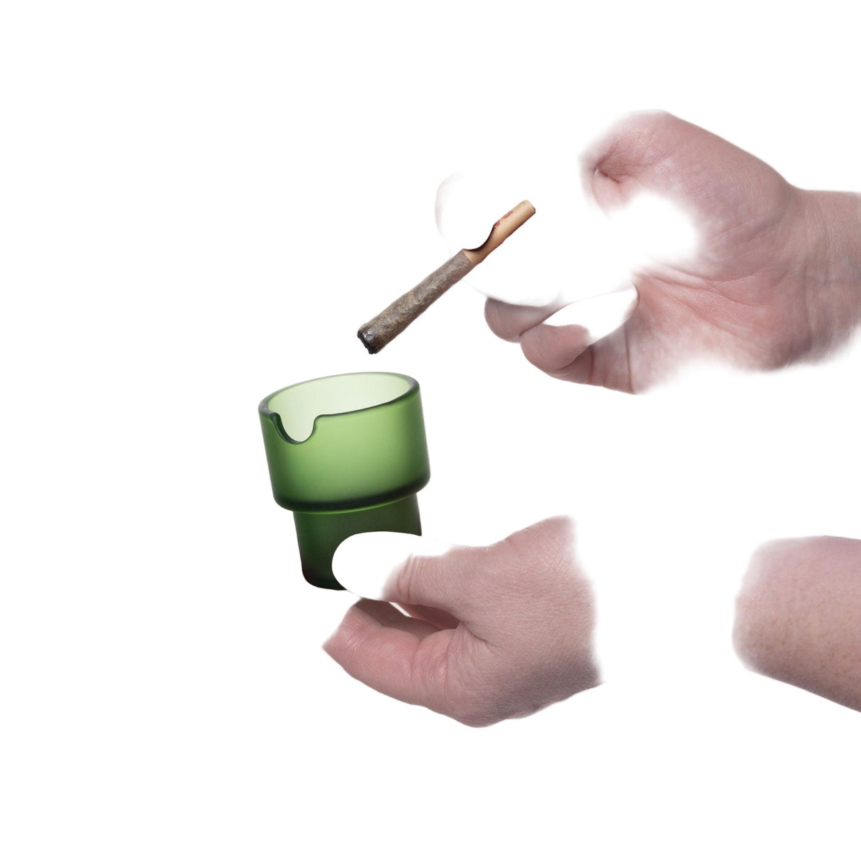 Hands display a Flower Pots Ashtray Set, showcasing a green frosted-glass vessel, highlighting its artistic and functional design within modern spaces.