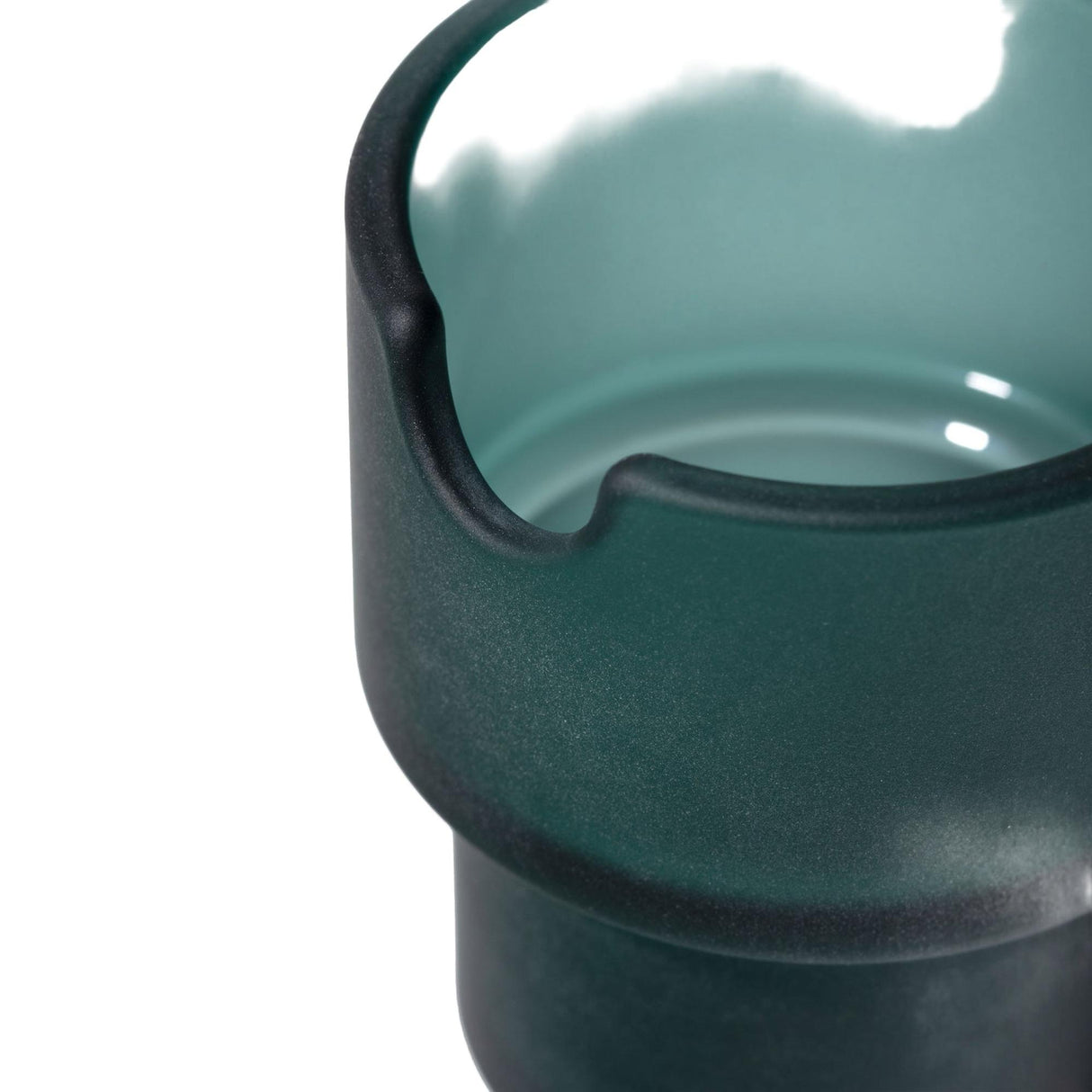Close-up of a dark green ceramic vessel with a glossy turquoise-green interior and a pouring spout, emphasizing the Flower Pots Ashtray Set's modern, functional art design.
