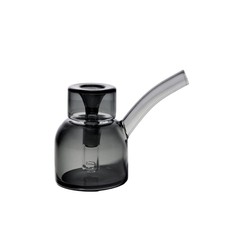 Vesper Bubbler in smoky-gray glass features a rounded chamber, angled mouthpiece, and built-in diffuser, embodying modern elegance and functionality for smooth, water-filtered pulls.