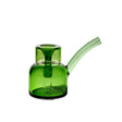 Vesper Bubbler with a bright-green glass design, featuring a rounded water chamber, integrated downstem, and side slanted mouthpiece for smooth, stylish smoking.