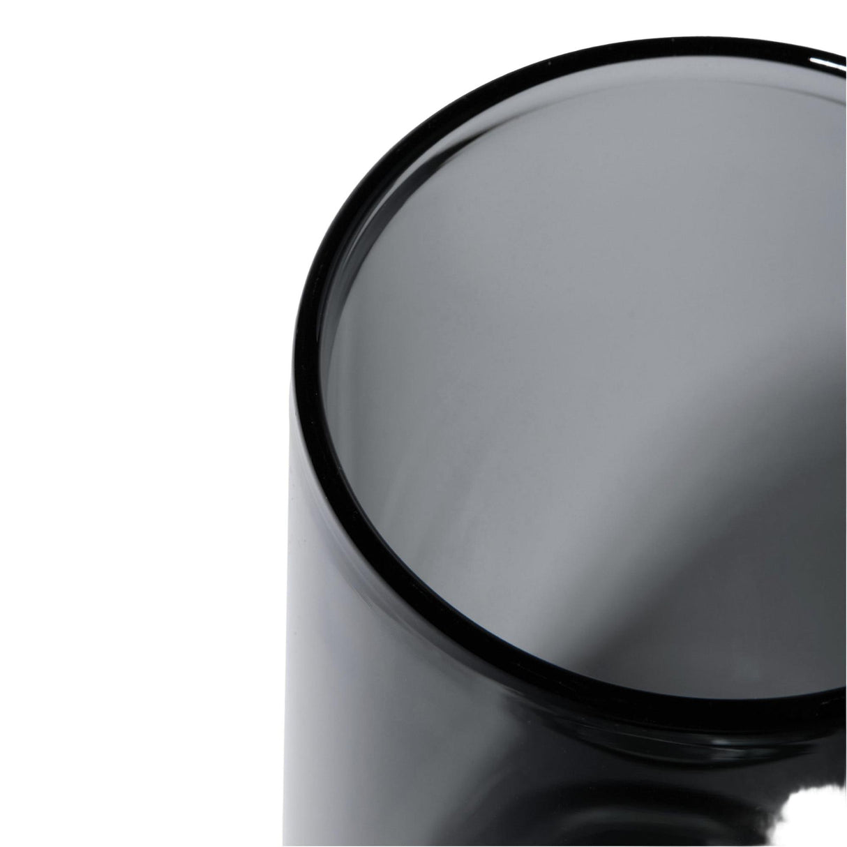 Close-up of a smoky-gray Vesper Gravity Bong, showcasing its smooth cylindrical glass design, exemplifying modern elegance and effortless functionality with gravity-powered performance.