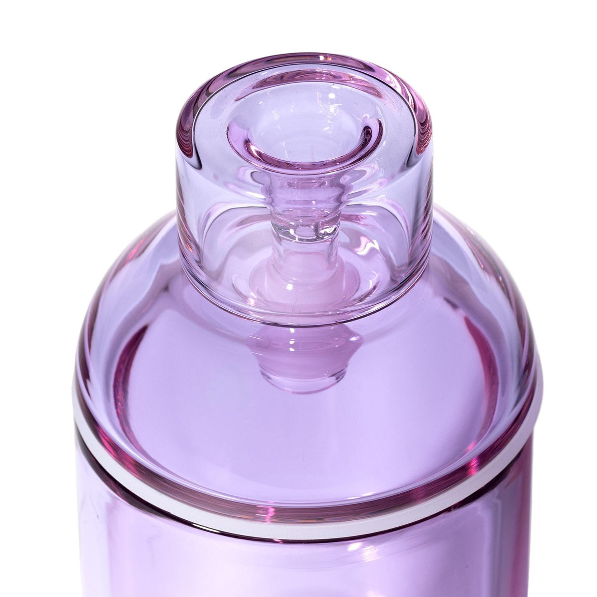 Vesper Gravity Bong, a sleek purple-tinted glass vessel with stopper and metallic accent, showcases elegant design and precision-engineered gravity function for smooth hits.