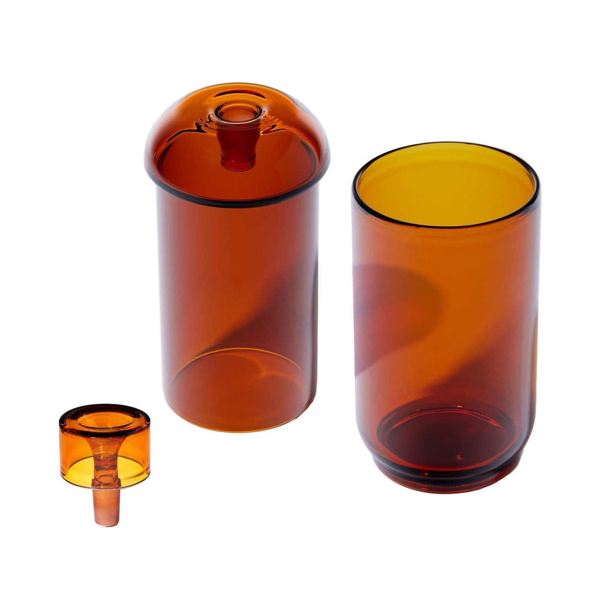 Vesper Gravity Bong: Amber-tinted glass set with a domed-lid vessel, matching tumbler, and stopper, showcasing a blend of vintage-inspired design and modern functionality.