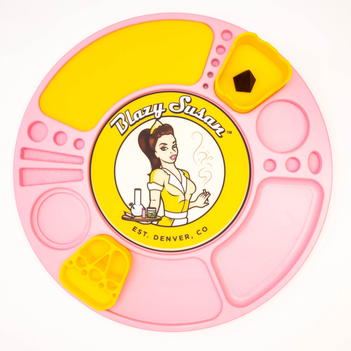 Blazy Susan Spinning Rolling Tray: round silicone tray with compartments, includes yellow insert cups and pin-up logo, for organizing smoking materials.