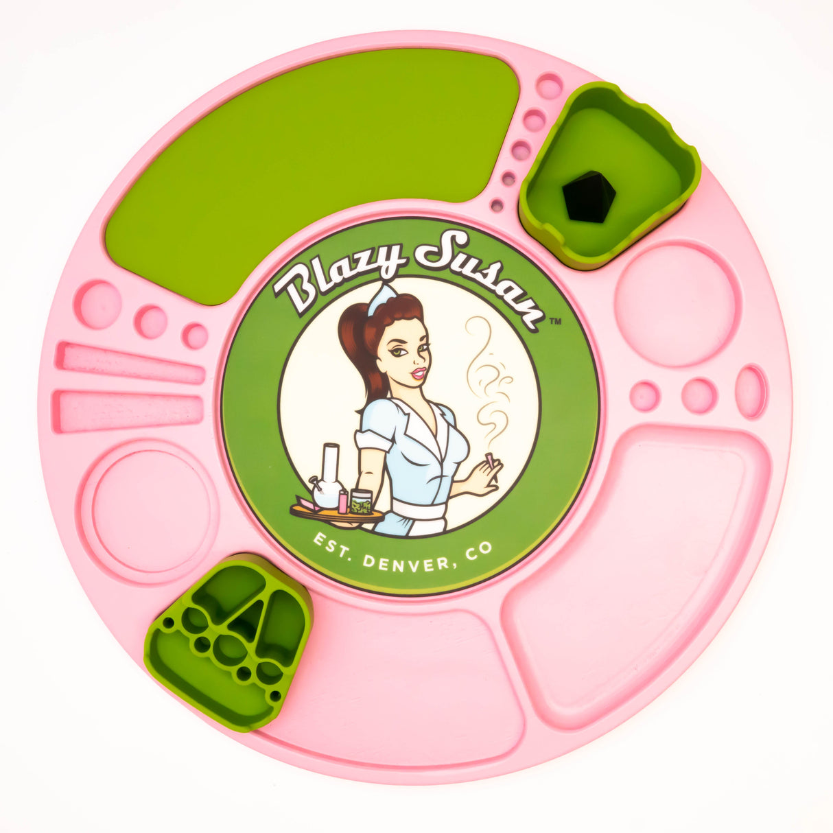 Spinning Rolling Tray by Blazy Susan: Round silicone tray with pink and green compartments, central logo of a waitress, and snap-in green insert cups for organizing cannabis accessories.