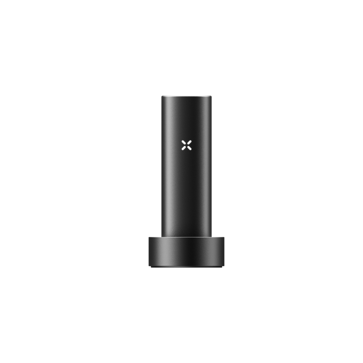 PAX FLOW vaporizer in matte-black, cylindrical design, resting in a round dock, featuring an illuminated “X” logo, highlighting its sleek, portable build.
