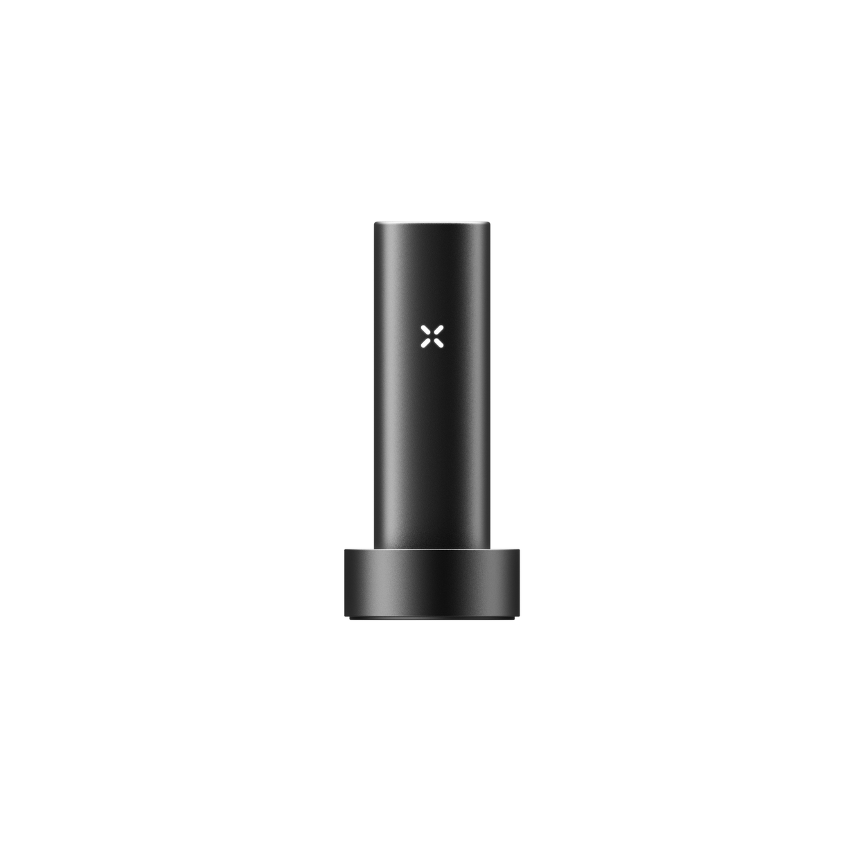 PAX FLOW vaporizer in matte-black, cylindrical design, resting in a round dock, featuring an illuminated “X” logo, highlighting its sleek, portable build.