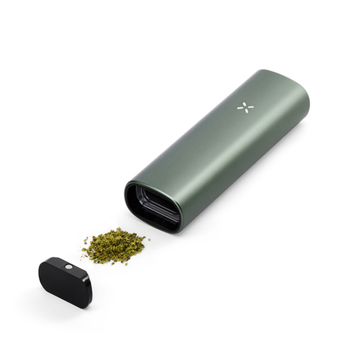 PAX Plus Dry Vaporizer Starter Kit featuring a sleek device with accessories like mouthpieces, USB cable, and wire brush alongside a small pile of green leaves.