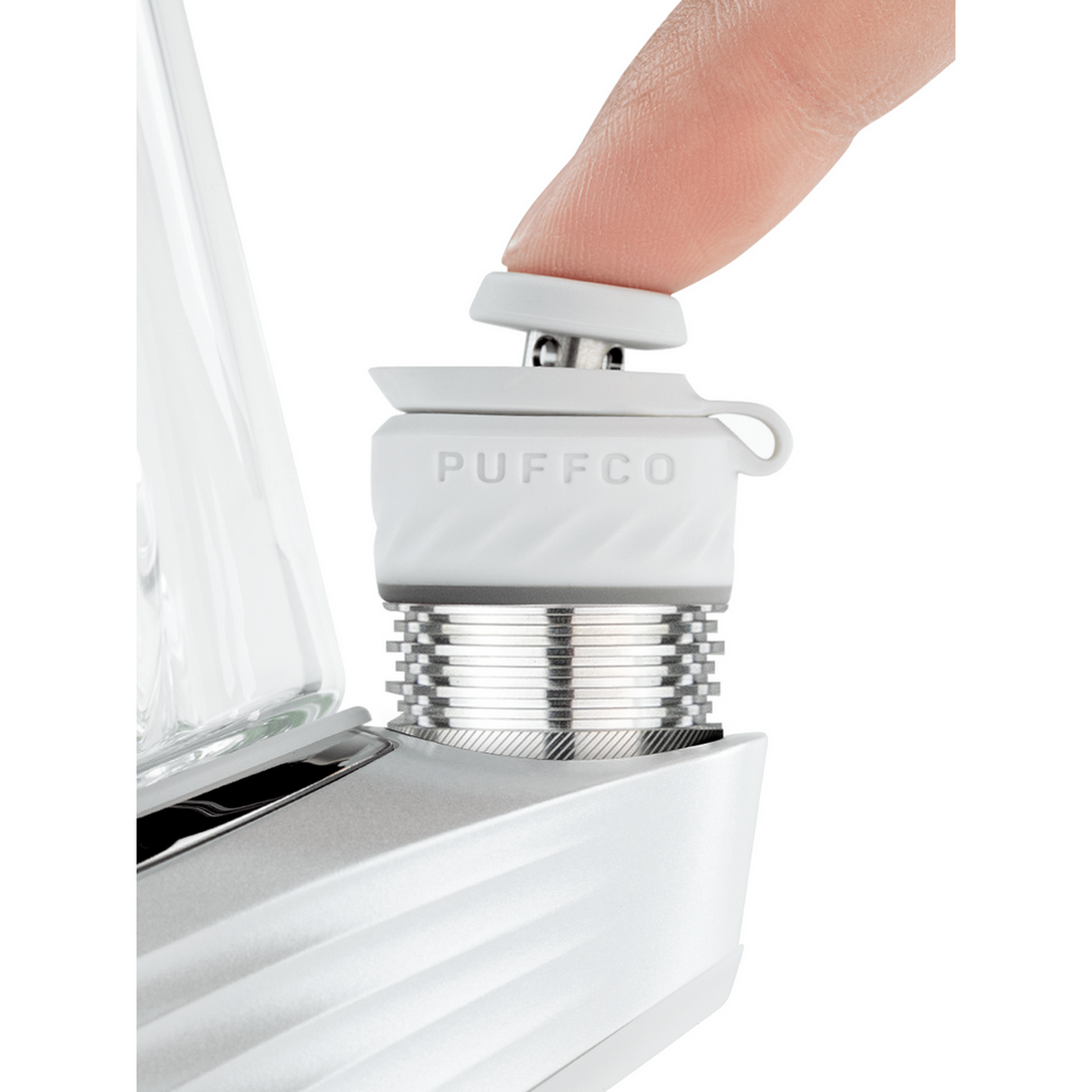 Close-up of Peak Pro 3DXL Electric Dab Rig’s chamber, highlighting the lifted white silicone/ceramic cap, metal threading, and part of the base.