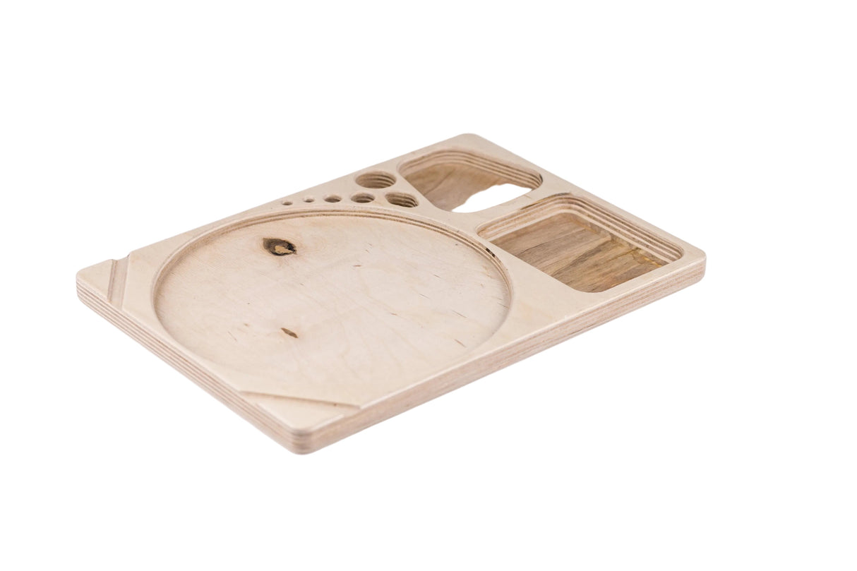 Blazy Susan Dab Tray: Birch wood serving board with circular depression, square wells, and small holes for organized setups and efficient merchandising.