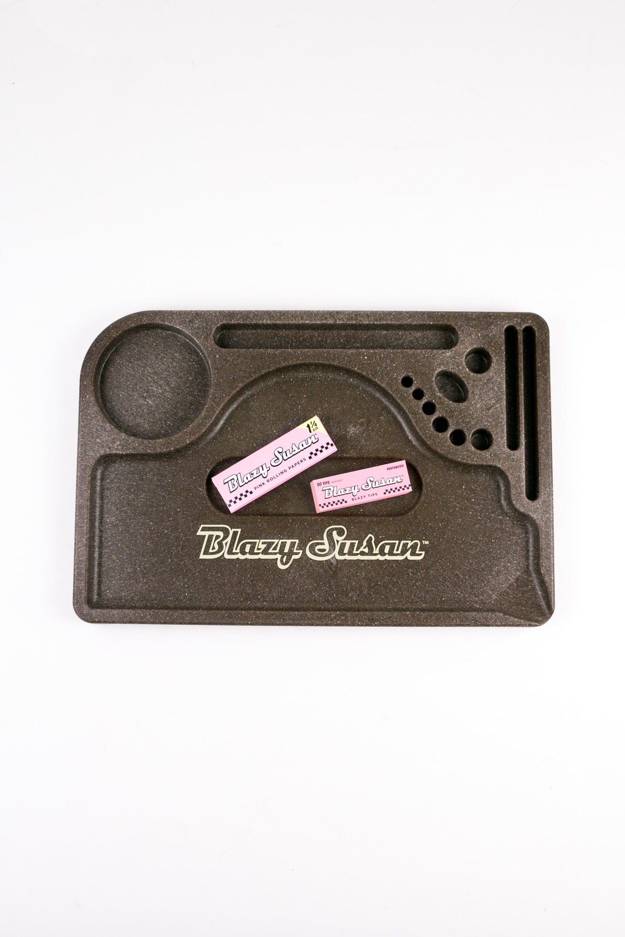 Hemp Plastic Rolling Tray with pink Blazy Susan paper packs, featuring a compartmentalized design for organizing smoking essentials, crafted from durable, biodegradable hemp plastic.
