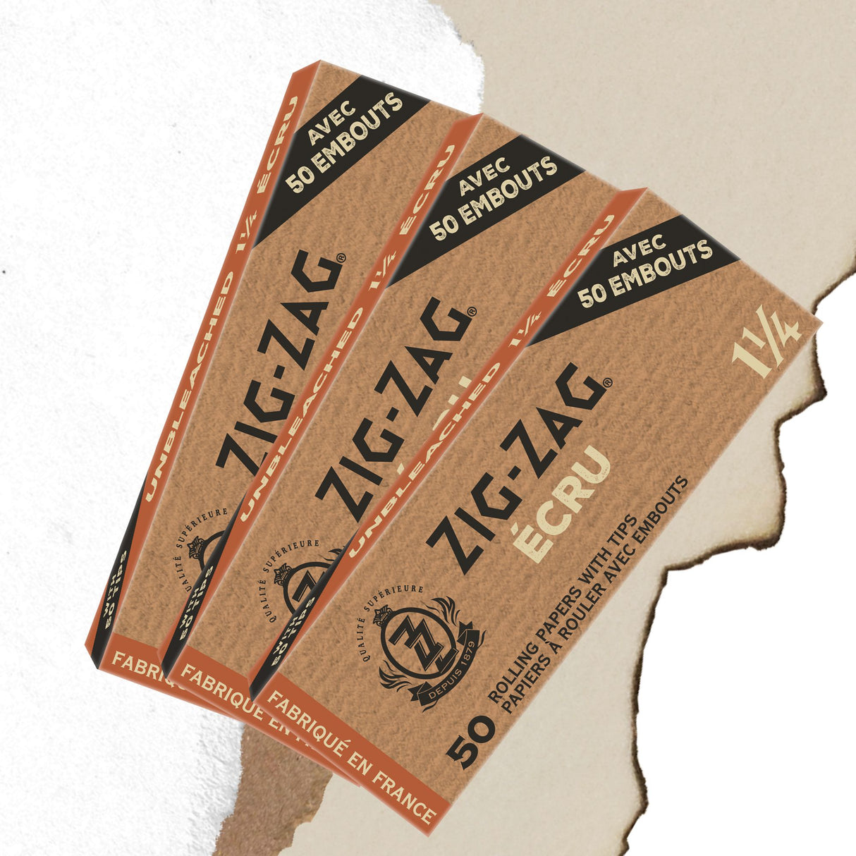 Unbleached 1 1/4 Papers & Tips with natural gum Arabic in brown and black packaging, featuring a crown logo and slow-burning, ultra-thin design.