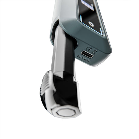 Hachi - Dark Gray handheld digital breathalyzer with fold-out mouthpiece, display, USB-C port, CE and disposal symbols, showcasing its portable and efficient design.