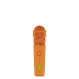 VEAZY Dry Herb Vaporizer with orange-anodized body, finned heat sink, round power button, and green LED indicator for status.