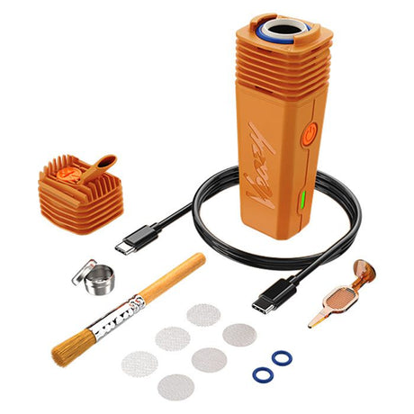 VEAZY Dry Herb Vaporizer kit includes vaporizer body, mouthpiece, USB-C cable, mesh screens, O-rings, loading cup, cleaning brush, and packing tool.