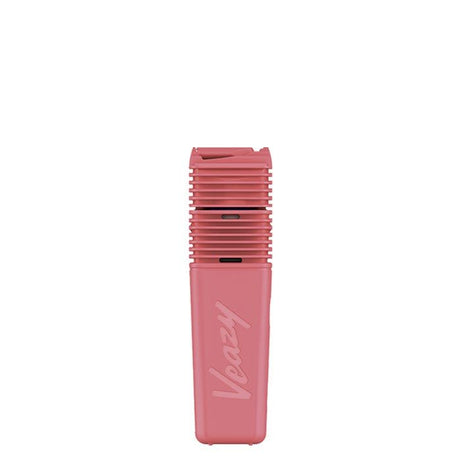VEAZY Dry Herb Vaporizer in matte pink, featuring horizontal vent slots and Veazy embossed, highlighting its compact, portable design and advanced heating technology.