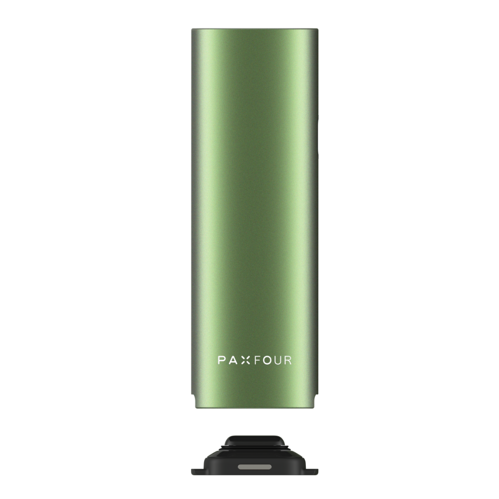 PAX FOUR portable vaporizer battery sleeve floating above magnetic charging puck, showcasing its compact design and modern charging capability.
