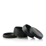 2.5 Multi Chamber Grinder - Black with knurled lid, interlocking teeth, collection chamber, and storage cap, showcasing Kannastör's precision-engineered, modular design.