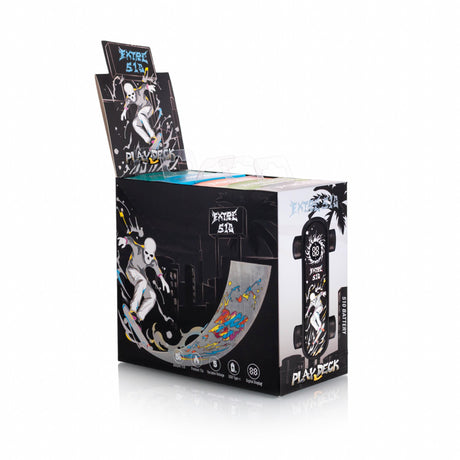 Counter-display box with retail packs of the Playdeck Skateboard 510 Battery, featuring a skeleton skateboarder, graffiti-style logos, and icons for USB-C charging and voltage settings.