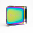 Blazy Susan Stainless Steel Rolling Tray with rainbow-iridescent finish, rectangular with rounded corners, ideal for organizing small items, embossed with Blazy Susan at the center.