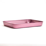Stainless Steel Rolling Tray, a sleek, shallow, rectangular metal pan with rounded corners, designed for organizing essentials, shown in a glossy finish.
