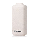 Houdini Smoke Filter by MJ Arsenal: Off-white speckled container with rounded corners, featuring a carbon filtration system for discreet odor elimination. Compact and portable design.