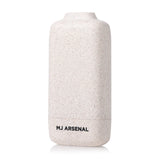 Houdini Smoke Filter by MJ Arsenal: Off-white speckled container with rounded corners, featuring a carbon filtration system for discreet odor elimination. Compact and portable design.
