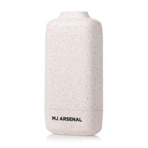Houdini Smoke Filter by MJ Arsenal: Off-white speckled container with rounded corners, featuring a carbon filtration system for discreet odor elimination. Compact and portable design.