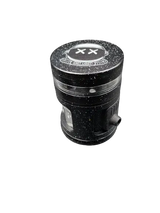 Earth Shaker Electric Herb Grinder & Dispenser, featuring a speckled black, multi-piece design with grinding teeth and a fine-mesh sifting screen, ideal for herbs.
