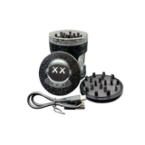 Earth Shaker Electric Herb Grinder & Dispenser disassembled: top lid with grinding teeth, middle chamber, magnetic bottom plate, USB charging cable shown alongside for visual context.