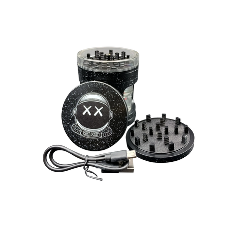 Earth Shaker Electric Herb Grinder & Dispenser disassembled: top lid with grinding teeth, middle chamber, magnetic bottom plate, USB charging cable shown alongside for visual context.